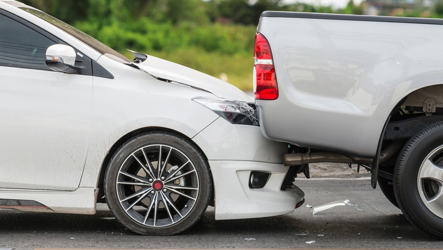 rear end collision between compact car and small pickup